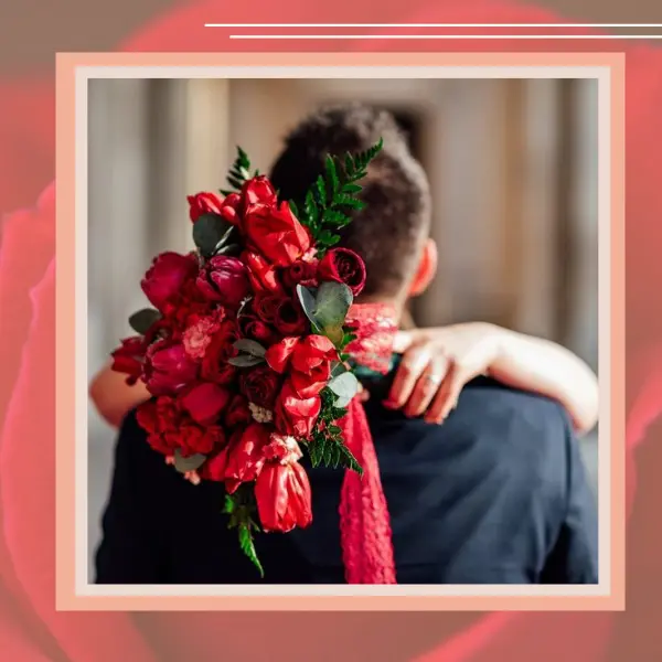mulher abraçando homem após ganhar flores