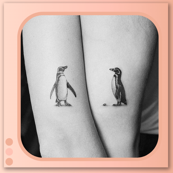 tatuagem de casal pinguim