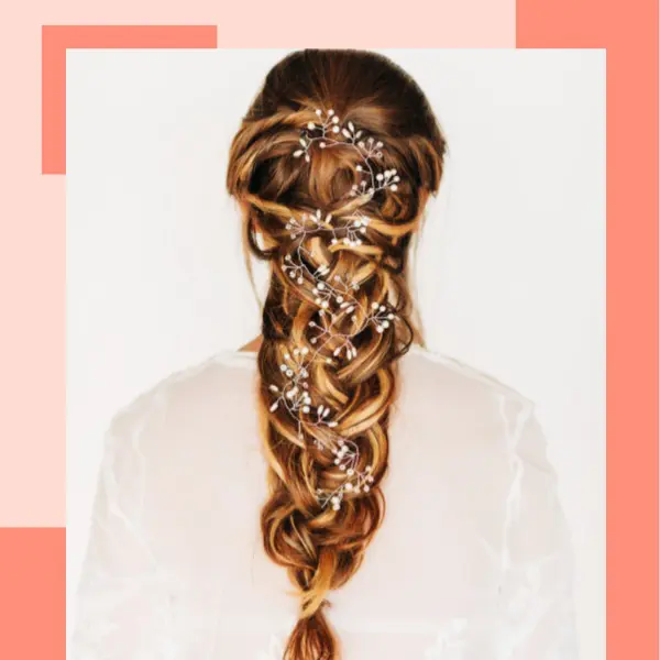 penteado de noiva cabelo longo com trança e flores