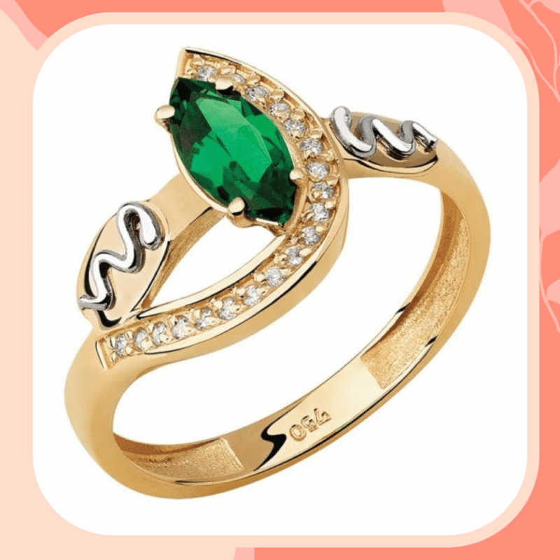 anel de formatura de ouro com esmeralda