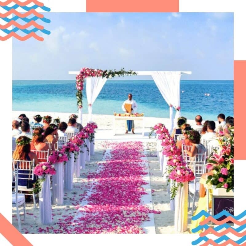 decoração de casamento na praia flores cor de rosa